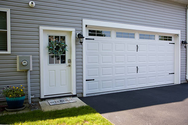 24/7 Emergency Garage Door Panel Replacement experts in Stamps, AR